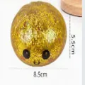 Antistress a forma di panino dorato glitterato con faccia buffa, variante 8,5cm - Panino Grande con Glitter Dorati ed Espressione (SZ0013) / Sacchetto OPP
