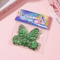 Large butterfly shaped squishy stress relief toy filled with green glitter and sequins - Green Butterfly