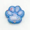 Stress relief blue cat paw squishy toy featuring colorful confetti and soft texture - Colored Blue