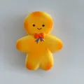 Yellow gingerbread man slow rebound squishy toy for stress relief with cute bow detail - Large / Gingerbread Man