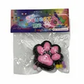 Pink cat paw squishy toy for stress relief sensory play in retail bag packaging - Black Base Pink