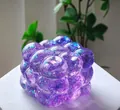 Purple bubble-shaped maltose squishy toy with interior glitter flakes for stress relief - Glitter Cube Squishy [Purple] OPP Bag