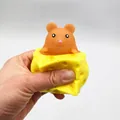 Adorable mouse in cheese squishy squeeze toy for stress relief and fun for all - Brown