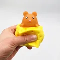 Adorable mouse in cheese squishy squeeze toy for stress relief and fun for all - Brown