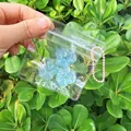 Detailed macro view of three blue translucent cat paw squishy toys in a clear zipper bag - Set of 3 / Blue