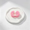 Stretchy pink sandwich cookie squishy toy with mochi effect and colorful sprinkles - Stretch Particle Oreo Style / Pink