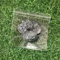 Vue rapprochée du jouet de décompression en forme de patte de chat à paillettes - Patte de Chat Ciel Étoilé Aurora Argent / 7cm