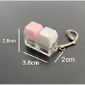 Compact pink and white dual keycap fidget keychain with clear base, dimensions 3.8x2.8x2cm - 2 Keys / No Light / White Pink