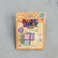 Detailed view of the retail blister packaging for the stress relief button keychain. - Macaron 4-Key Grid (Cardboard Pack) / No Light (Random Color)