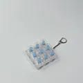 Detailed macro view of a 9-key clear mechanical switch tester keychain fidget toy - Without Lights / Transparent Nine Key