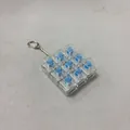Detailed view of a 9-key mechanical switch fidget toy keychain for stress relief - 9-Key / Without Lights / Clear White