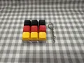 9-Key mechanical keyboard switch tester fidget toy with German flag colors keychain - Black Red Yellow