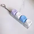 Portable 4-key mechanical keyboard switch tester keychain with macaron colored keycaps - Purple White Blue White