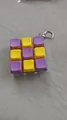 Mechanical 9-key fidget keychain toy with alternating purple and yellow keycaps - 9-Key Purple Yellow Alternating (00006)