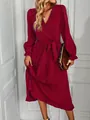 Close-up detail of burgundy tiered maxi dress with long sleeves and elegant waist tie bow - S / Burgundy