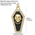 Detailed view of gold coffin skull pendant with zircon inlay and black enamel details. - Creative Black Skull Coffin Style (B)