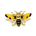 Detailed close-up shot of a decorative yellow and black enamel bee napkin ring - Little Bee Style 2