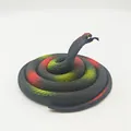 Realistic coiled toy snake model with colorful scales for pranks and educational display - 80cm Cobra / Black Leopard Print