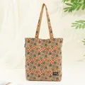 Close-up of bohemian eco-friendly cork tote bag with vintage geometric mandala pattern - Colorful Plaid Tote Bag