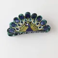 Detailed view of a decorative peacock-shaped hair claw clip made of colorful acetate - Spreading Peacock (1#)