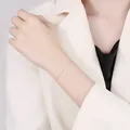 Detailed view of a minimalist S925 sterling silver bracelet elegantly worn on a wrist - 925 Silver / Silver