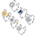 Set van zes roterende fidget ringen voor angstverlichting met bloem- en stermotieven - 6-Delige set
