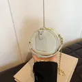 Elegante mini bolso redondo bandolera en azul claro con cadena dorada para niñas - Verde