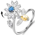 Adjustable silver spinning flower ring with blue and yellow zircons for anxiety relief - Bee Style