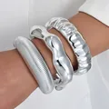 Elegant set of three silver irregular open bracelets with premium metallic finish - Irregular Shiny Silver Bangle (6686001HB) / Three-Piece Set / Mirror Silver
