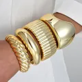 Chunky gold irregular cuff bracelet and stacked bangle set for a bold fashion statement - Mirror Large Wave Bangle (6686301HB) / Four-Piece Set / Mirror Gold