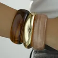 Chunky acrylic and gold-tone metal bracelet set for women with minimalist modern design - Minimalist Round Bangle Set (6755201) / Three-Piece Set / Amber Gold Pink Combo