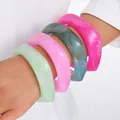 Vibrant set of colorful acrylic resin bangles featuring irregular chunky design on arm - 6109533416067 / Irregular Geometric Wide Bangle Set (6756701HB) / Green Cloud/Pink/Blue-Green Marble/Rose Combo