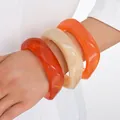 Vibrant acrylic irregular bangle set featuring marble texture and a premium glossy finish - Irregular Streamline Style (6756801HB) / Red-Orange and Cream Marble Combo