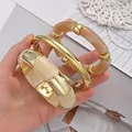 Luxury minimalist acrylic and gold open bangle bracelet set in cream white and amber colors - Bamboo Joint Splicing Style (6764602HB) / Gold Cream White and Amber Combo