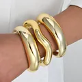 Gold irregular acrylic open bracelet set with a minimalist and bold designer look - 3-Piece Wave Irregular Open Bangle (6649201HB) / Gold