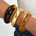 Vintage set of three chunky acrylic and shiny gold finish bracelets, SKU variant display - Arc Open Style (6646201HB) / Set of 3 / Tortoiseshell And Gold