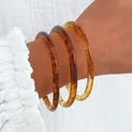 Elegant set of three acrylic tortoiseshell bangles featuring amber mottled patterns - Simple Wave Bangle (6639701) / Set of 3 / Coffee