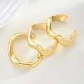 Elegant set of 3 irregular wavy open bracelets featuring a premium high-shine gold finish - Irregular Wave Bangle (6646106HB) / Set of 3 / Gold