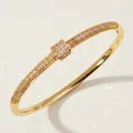 Elegant gold-plated T-shaped bangle bracelet featuring pavé cubic zirconia accents - Gold Trendy Bangle BS-J5522G