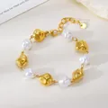 Elegant gold charm bracelet featuring irregular white pearls and crushed gold nuggets - Artificial Pearl Bracelet (5) / Gold
