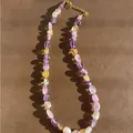 Close-up detail of a colorful natural stone beaded necklace with a white freshwater pearl - One Size / Dreamy Purple Necklace