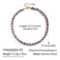 Macro shot of purple natural stone necklace with stainless steel gold chain detail - Amethyst / Purple (YYN026059-PE)