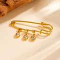 Detailed view of gold plated stainless steel safety pin pendant with three rhinestones - Safety Pin White Rhinestone Brooch Style (A616)