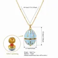 Detailed light blue floral egg locket necklace in gold plated copper with measurements - December Flower