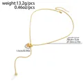 Vista dettagliata con le dimensioni di questa collana in acciaio dorato con cuore - Collana a Y con ciondolo a cuore / Oro (07664)