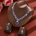 Elegant bridal jewelry set featuring blue teardrop necklace and matching earrings in silver - Two-Piece Set / Blue