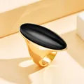 Bague élégante vintage en métal doré avec une grande pierre ovale noire en résine - Noir
