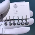 Set aus drei Paaren Schnecken-Ohrreifen mit Zirkonia-Mikropavé in Silberoptik - Schneckenform Stil (2835)