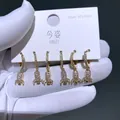 Elegantes Set aus 3 Paaren vergoldeter Creolen mit funkelnden Zirkonia-Raketenanhängern - Goldene Rakete Stil (2831)