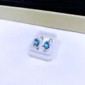 Ohrstecker in Fischform mit blauen Zirkoniasteinen und Edelstahlschraube - Silberner Blau-Zirkonia-Fischstil